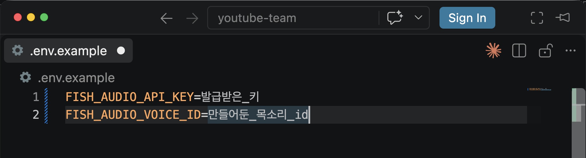 편집기에 열린 .env 파일. FISH_AUDIO_API_KEY와 FISH_AUDIO_VOICE_ID 두 줄이 있고, = 뒤에는 '발급받은_키', '만들어둔_목소리_id'라고 자리만 잡혀 있다